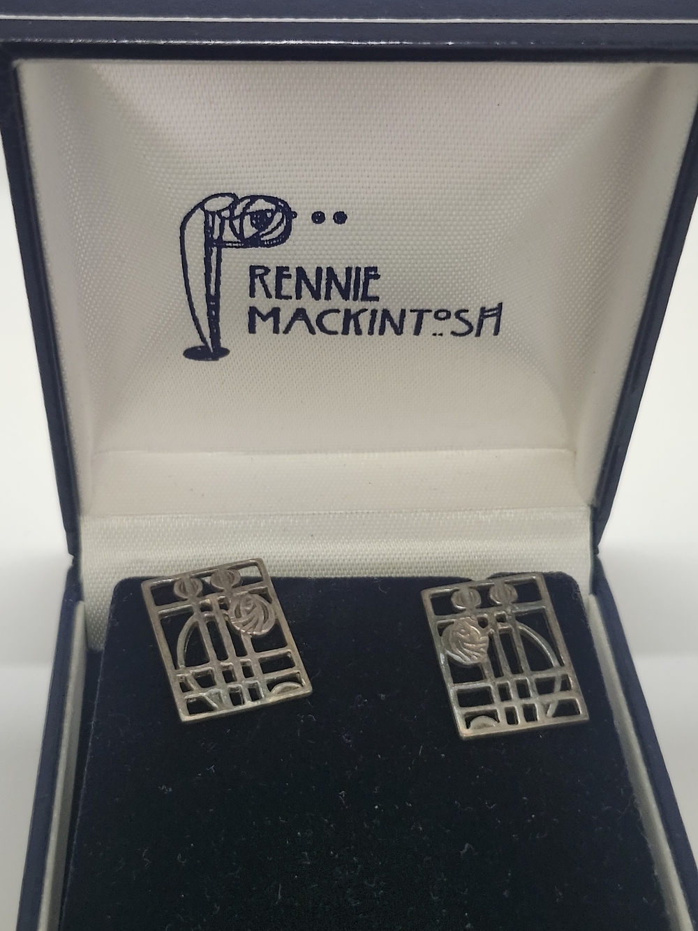 These are sterling silver earrings from the Rennie Mackintosh Collec